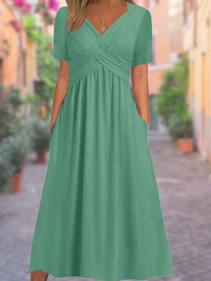 Groene midi zomerjurk voor vrouwen, ideaal voor een elegante en ontspannen look