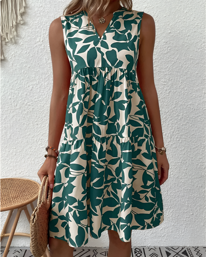 Dames zomer midi-jurk van katoenmix met V-hals en elegante knoopsluiting, ideaal voor casual lente look.