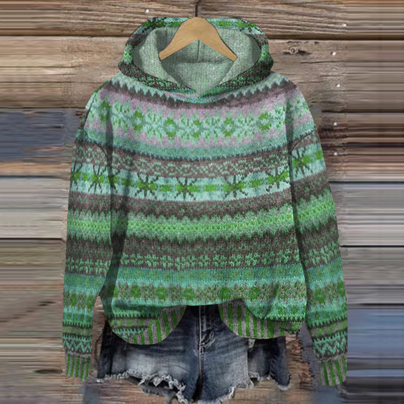 Modieuze dames winterhoodie met opvallend Noors patroon; comfortabele en warme trui, essentieel voor stijlvolle vrouwenkleding.