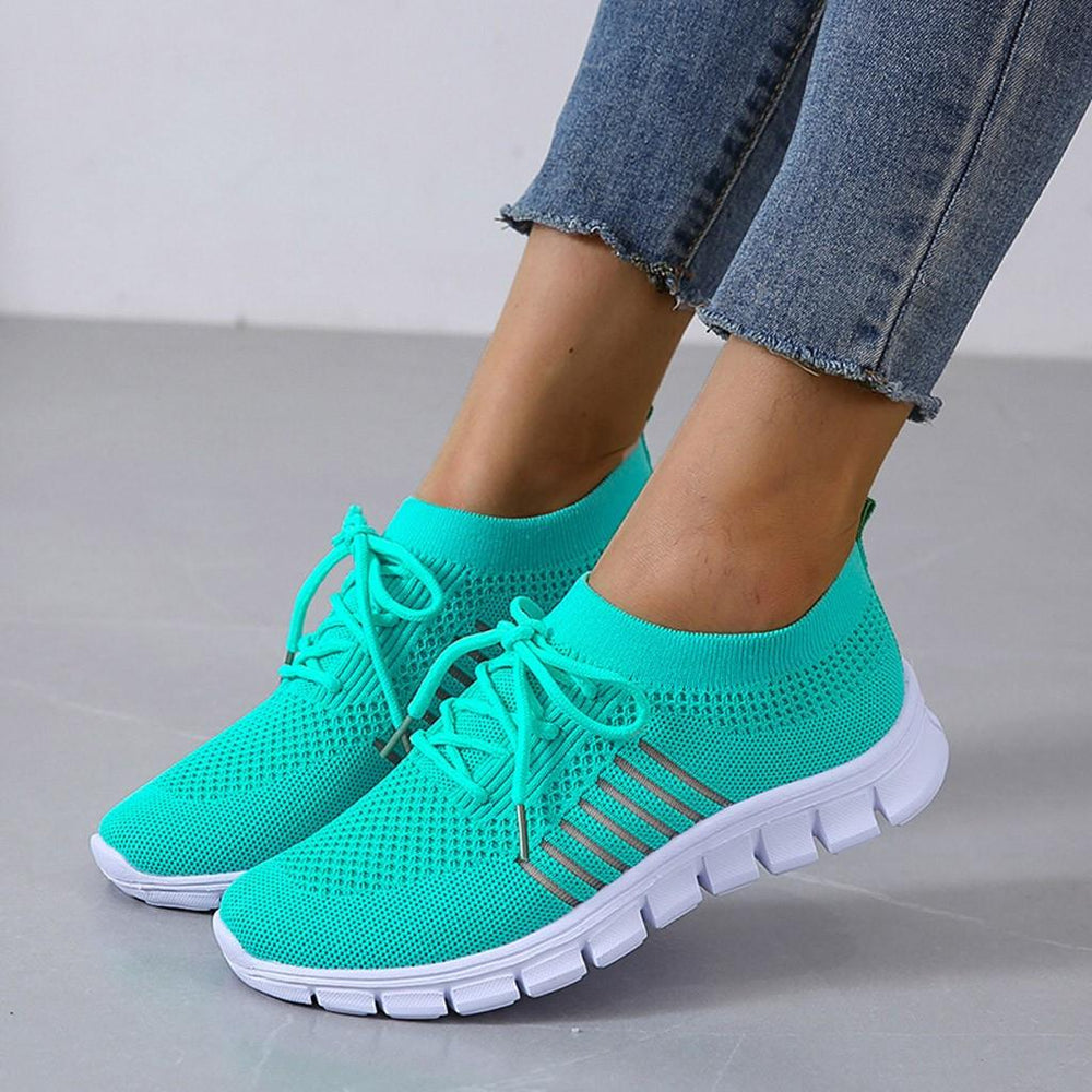 Turquoise orthopedische comfort sneakers voor dames, passend bij casual jeans.