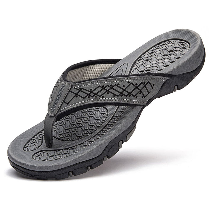 Stijlvolle rode orthopedische herenslippers met ergonomisch voetbed voor comfort en stijl.