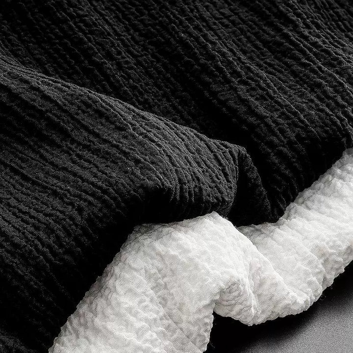 Complete heren kledingset, luchtig en stijlvol. Witte zomeroutfit voor maximaal comfort.