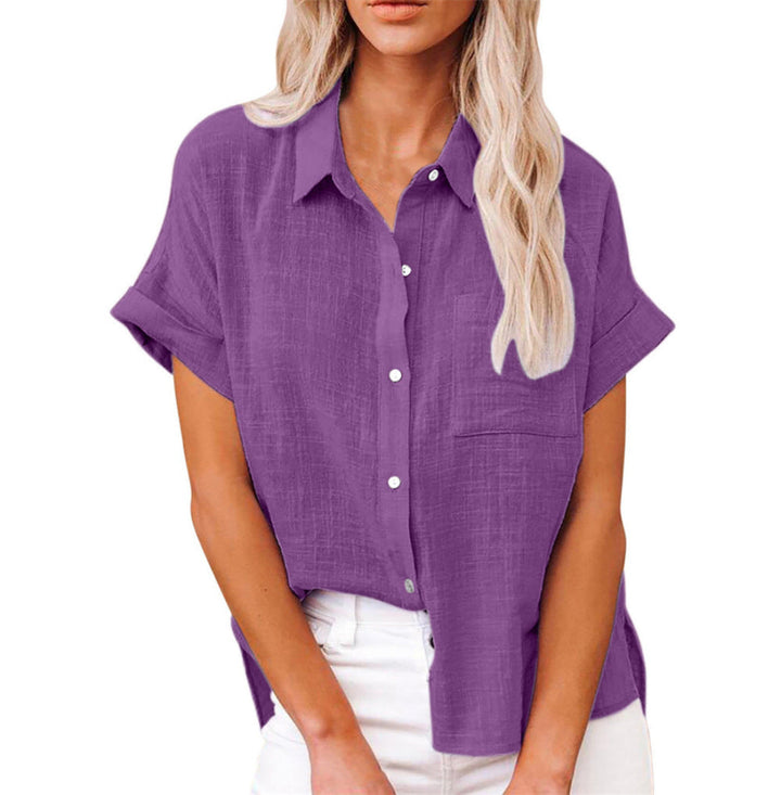 Effen Yara dames blouse, elegant en praktisch voor de zomer. Met knoopsluiting en comfortabele pasvorm.