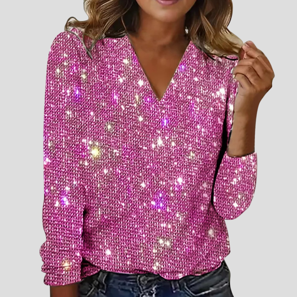 Sprankelende roze V-hals glitterblouse met lange mouwen.