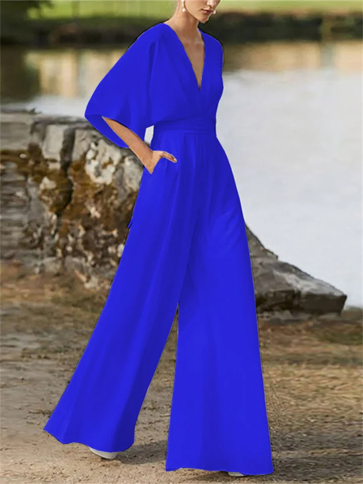 Volledige lengte foto van stijlvolle dames jumpsuit met wijde pijpen