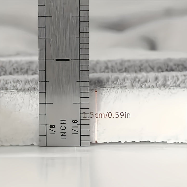 Sterk absorberende badmat met antislip rug, perfect voor een droge en veilige badkamer. Zachte polyester vloermat.