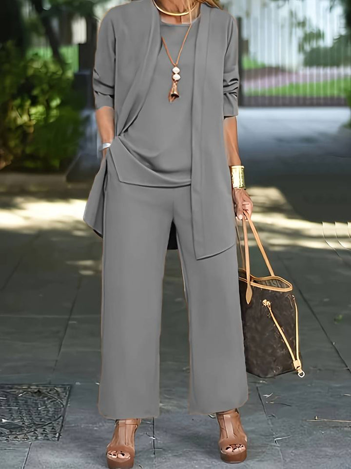 Veelzijdige driedelige dames broekpak set voor ultiem comfort en elegante stijl; vest, top en broek.