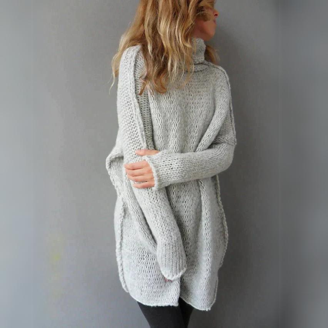 Modieuze dames wintertrui in een lange, oversized stijl, perfect voor dagelijks comfort.