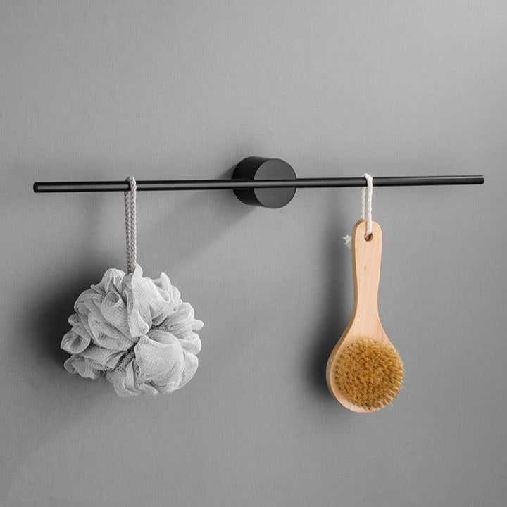 Stijlvolle zwarte handdoekhouder, strak design voor moderne badkamerorganisatie.