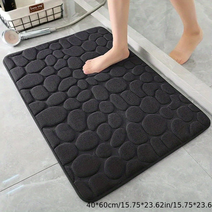 Geniet van comfort en veiligheid met deze ultrazachte antislip badmat. Absorberende polyester vloermat voor een droge badkamer.