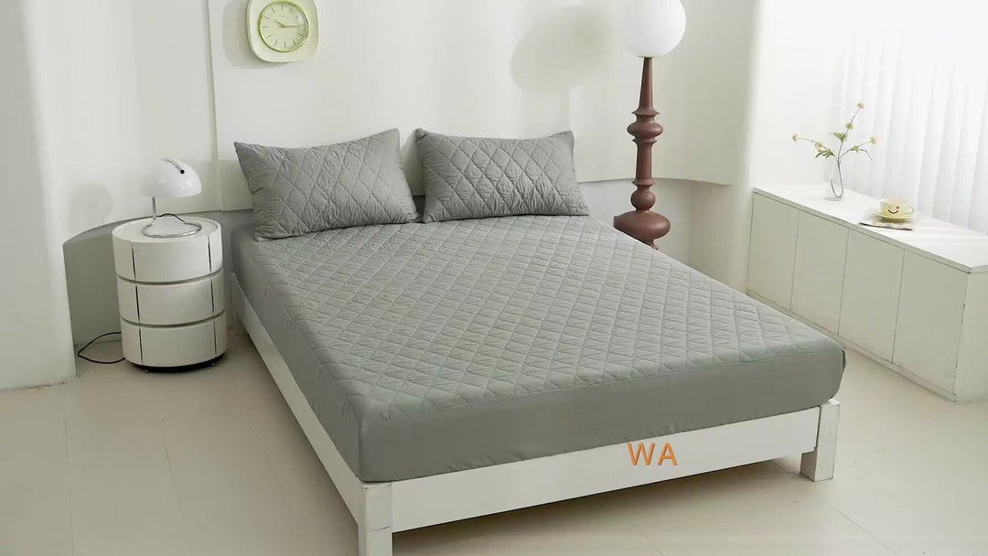 Overzicht van de ademende beschermhoes voor het matras in het wit