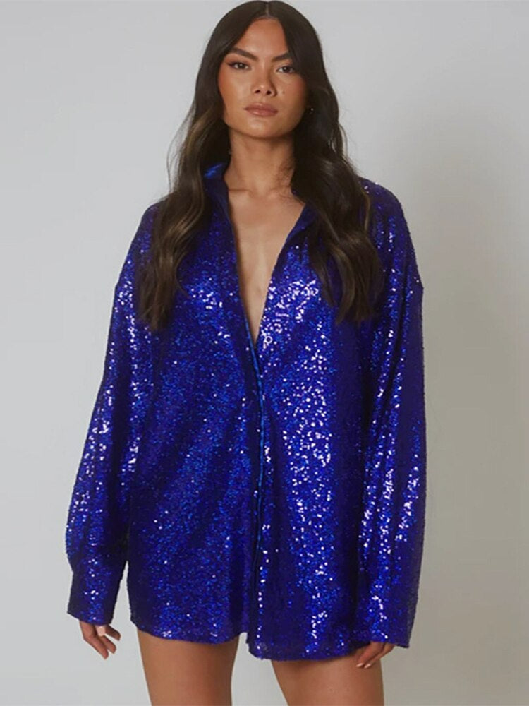 Elegante oversized glitterblouse voor dames; combineer comfort met een sprankelende en stijlvolle uitstraling.