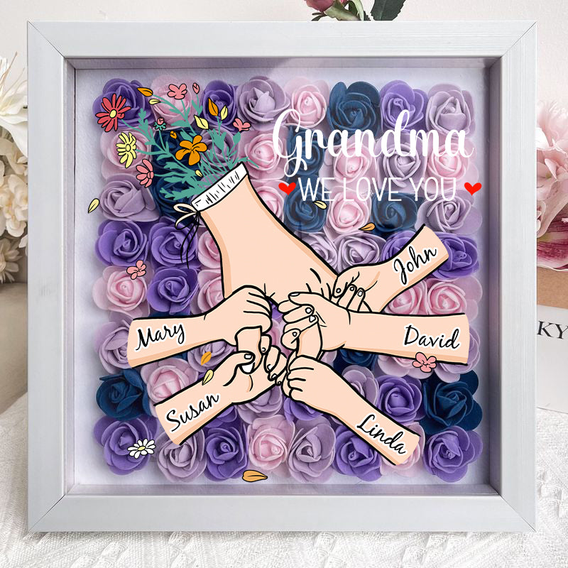 Een uniek gepersonaliseerd geschenk voor moeder: bloemen schaduwdoos met namen van de familie.