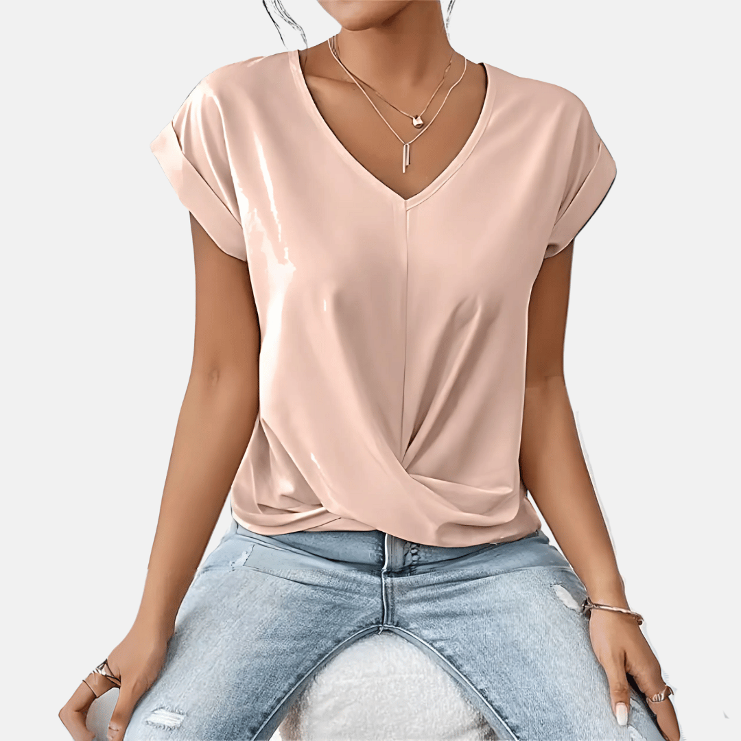 Elegante damestop met gedrapeerde zoom voor een casual en modieuze look