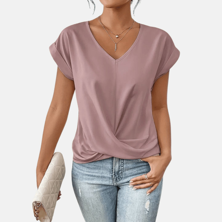 Achterkant van de casual dames top met korte mouwen en comfortabele pasvorm