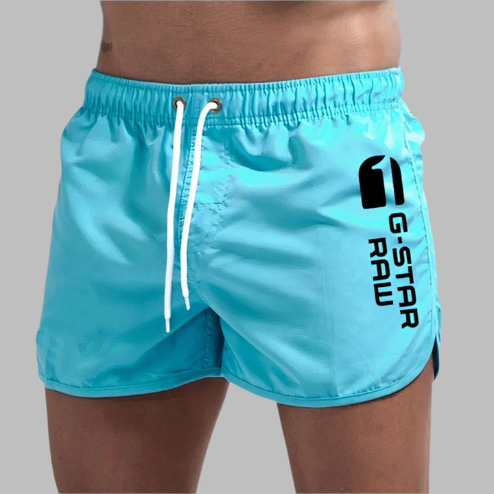 Heren sneldrogende zwembroek, perfect voor strand of actieve watersport. Comfortabele waterkleding voor de zomer.