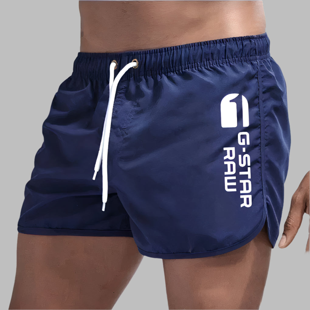 Sportieve heren zwembroek, effen kleur en sneldrogend. Geschikt voor zwemmen, strand en zomerse ontspanning.