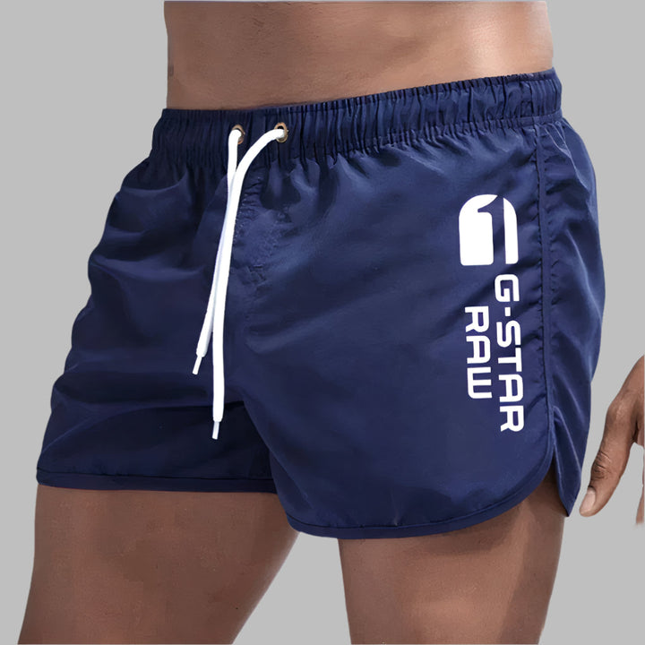 Sportieve heren zwembroek, effen kleur en sneldrogend. Geschikt voor zwemmen, strand en zomerse ontspanning.
