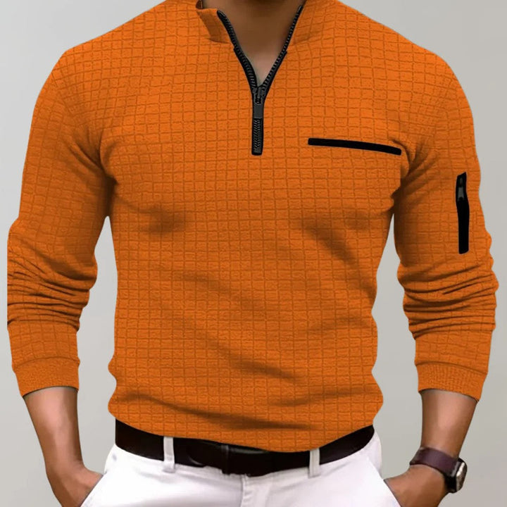 Oranje heren poloshirt met moderne textuur en rits