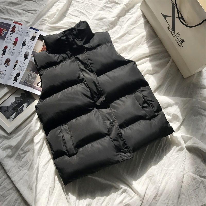 Stijlvolle zwarte bodywarmer Bo voor dames, casual en warm. Essentiële mouwloze dameskleding voor buiten.
