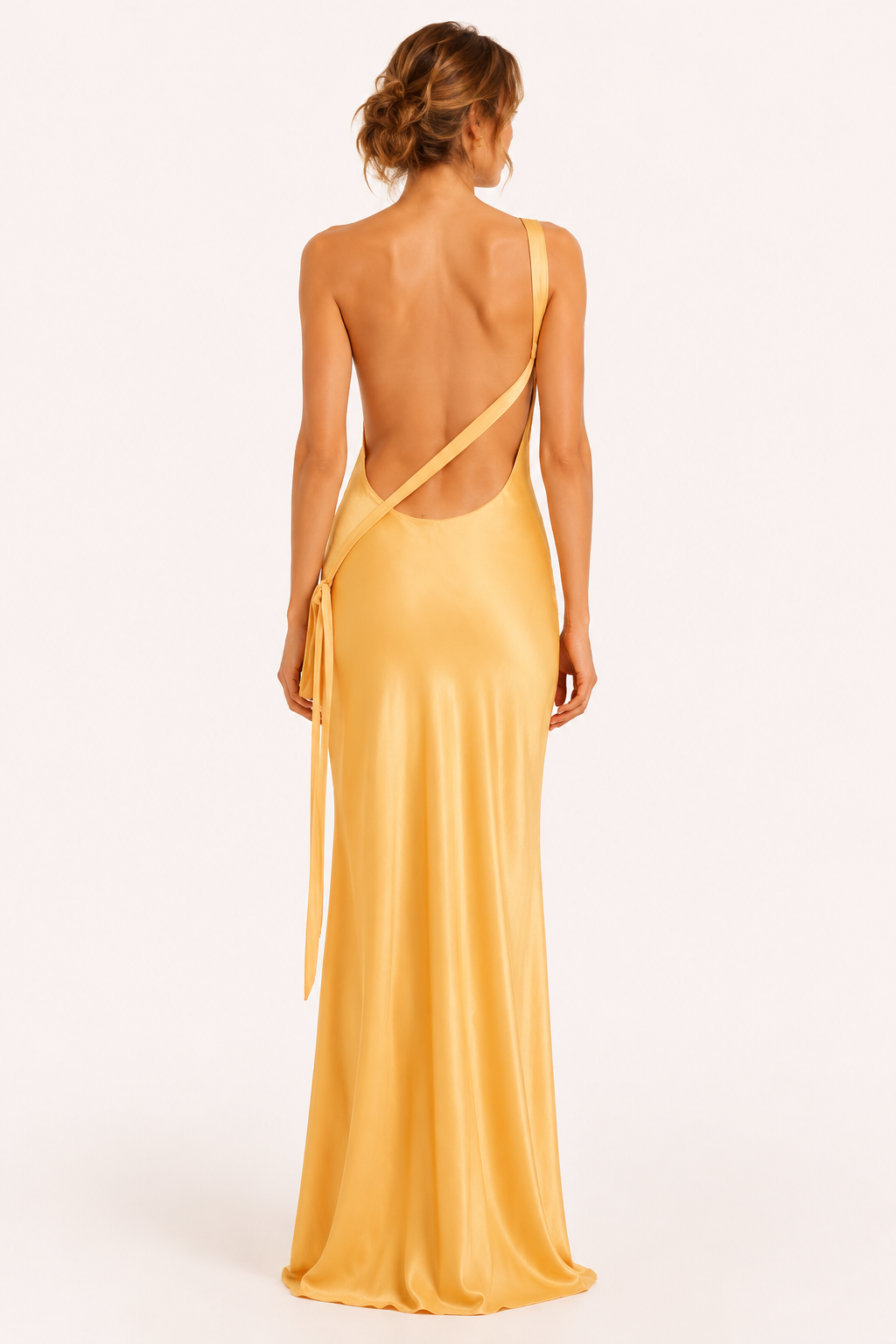 Dames one-shoulder lange jurk in het geel achteraanzicht