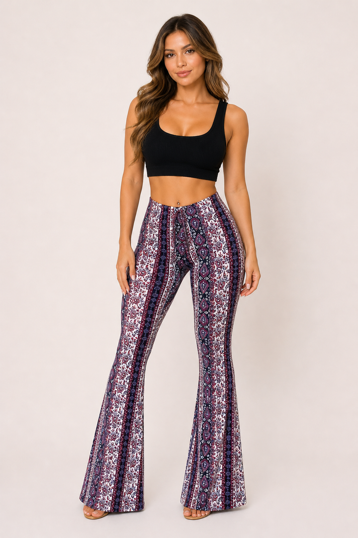 Trendy damespantalon met verticale print, hoge taille en wijd uitlopende pijpen. Perfecte zomerbroek.