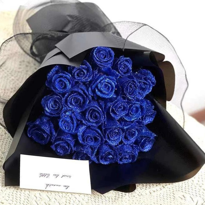 Blauwe glitterrozen in een stijlvolle zwarte geschenkdoos