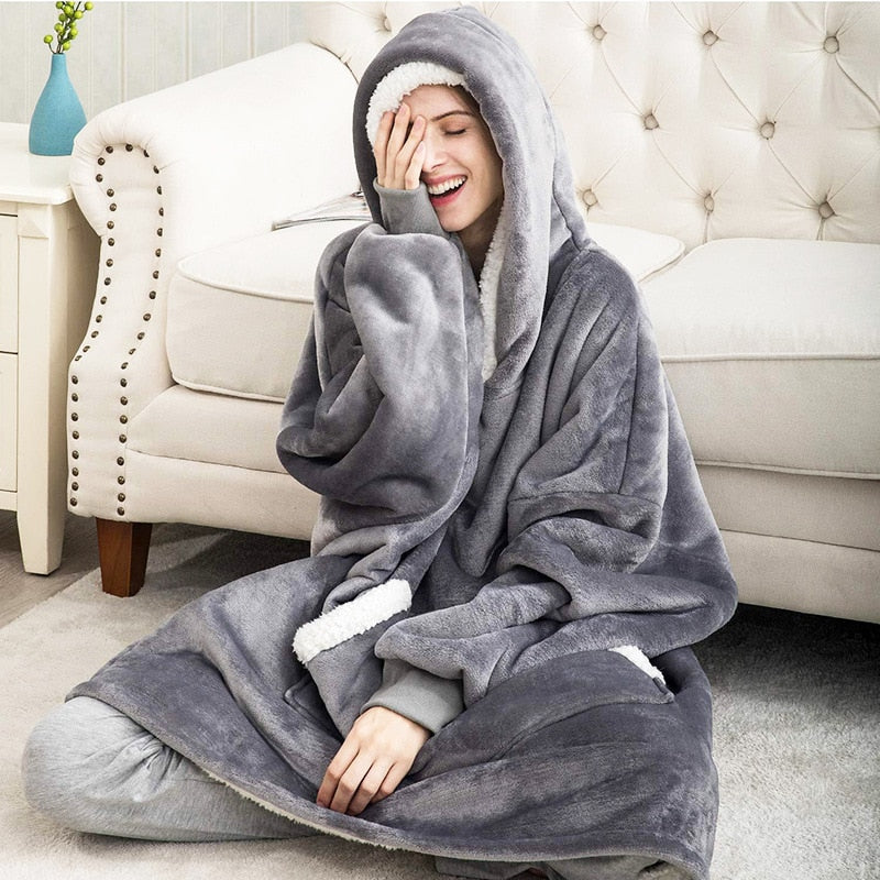 Unisex hoodie deken voor ultiem comfort & warmte thuis. Ideaal voor knusse avonden.