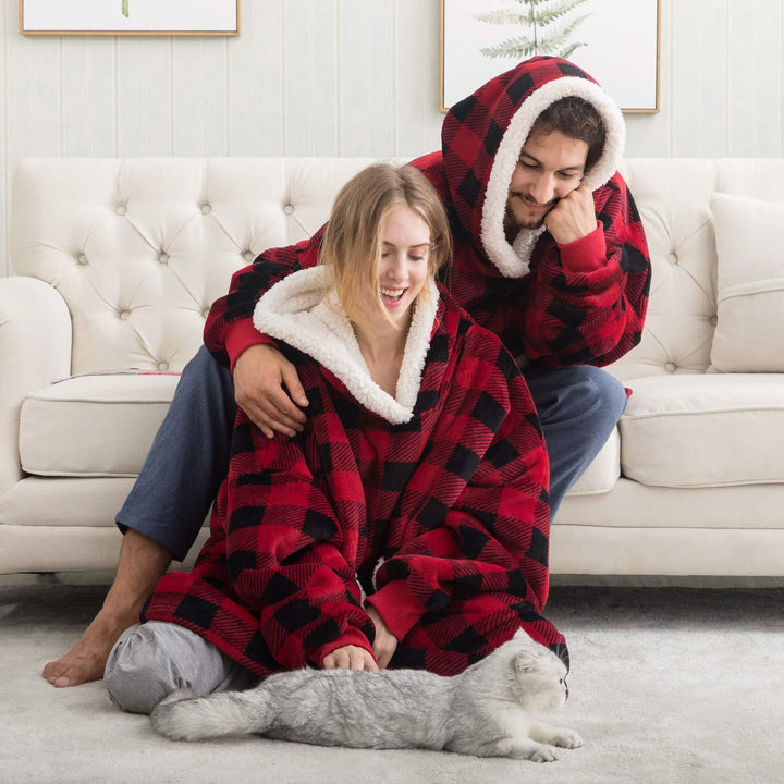 Zachte, oversized hoodie deken, perfect voor ontspanning op koude winteravonden.