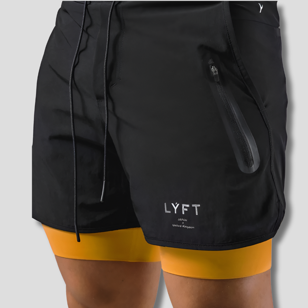 Heren 2-in-1 sportbroek met compressie voor optimale prestaties. Ademend en sneldrogend, ideaal voor workouts.