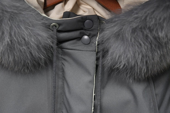 Warme dames winterjas, luxe afwerking, thermisch comfort, winterse elegantie.