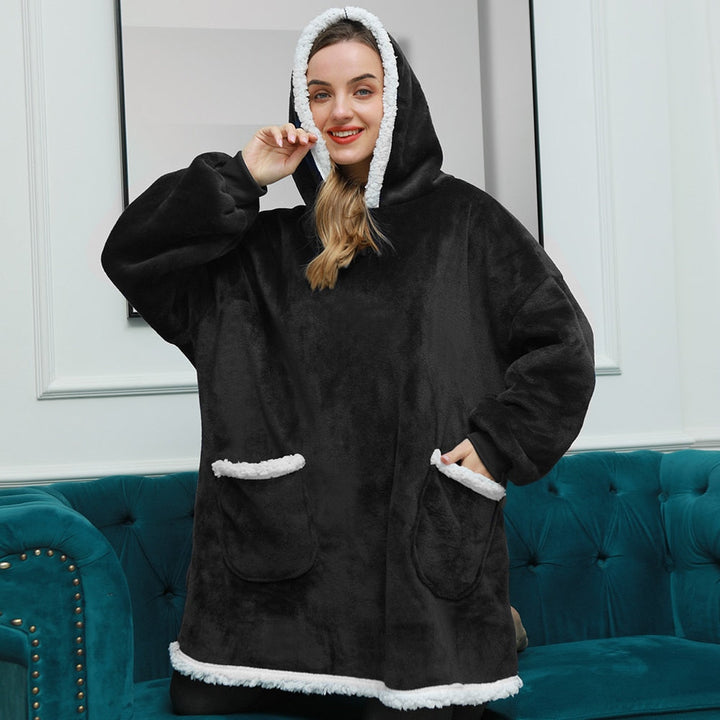 Comfortabele hoodie deken, onmisbaar voor koude winterdagen. Ultieme loungewear.