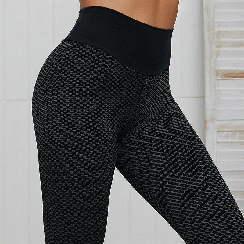 Modieuze sportlegging met hoge taille die zorgt voor een slikkere taille.