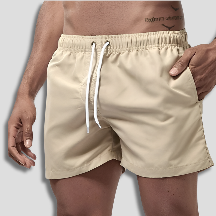 Detail van de elastische tailleband van comfortabele heren zwemshorts voor een perfecte pasvorm.
