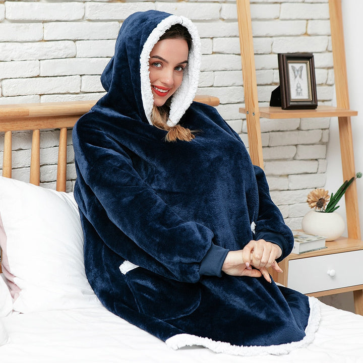 Perfect als cadeau: de zachte, warme unisex hoodie deken. Een blikvanger.
