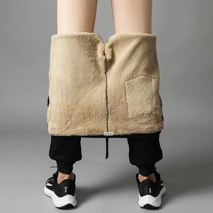 Stijlvolle zwarte heren thermobroek, met trekkoorden. Veelzijdig voor wintermode, casual of actieve lifestyle.