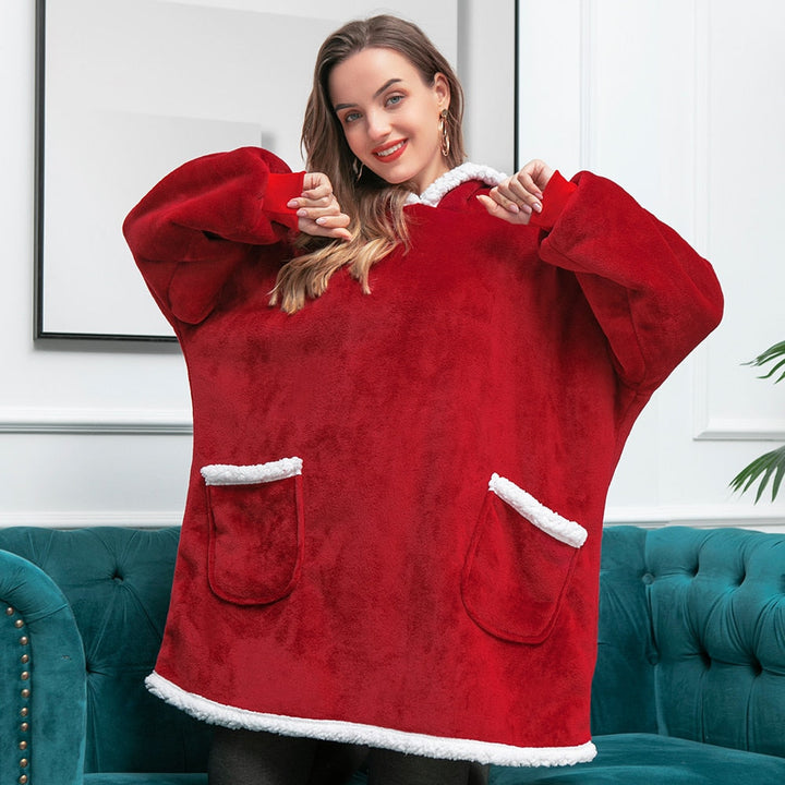 Warm en knus in deze oversized hoodie deken. Heerlijk thuis en ontspannen.