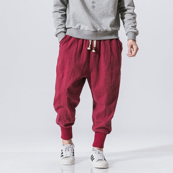 Heren harembroek met zijzakken, praktisch en modieus voor streetwear outfits.
