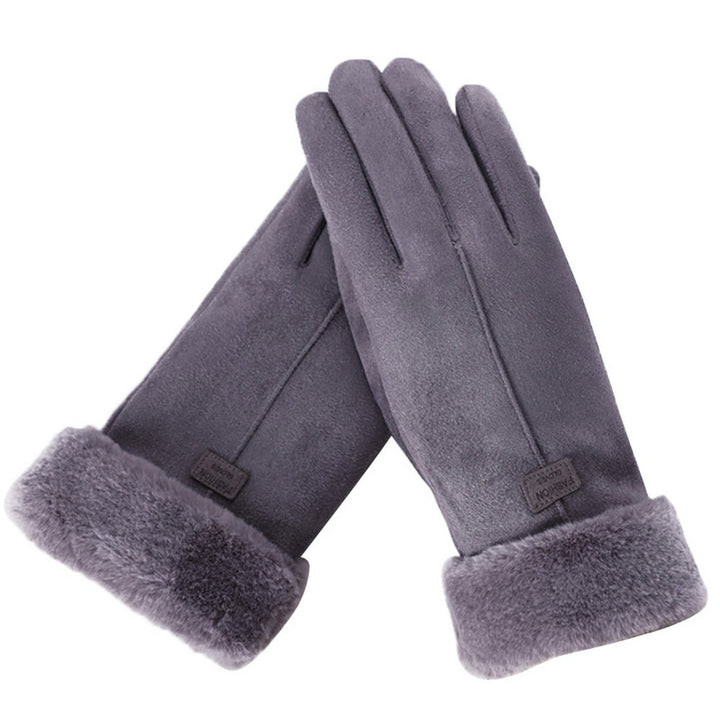 Waterafstotende furry dameshandschoenen, perfect voor koude en natte herfstdagen.