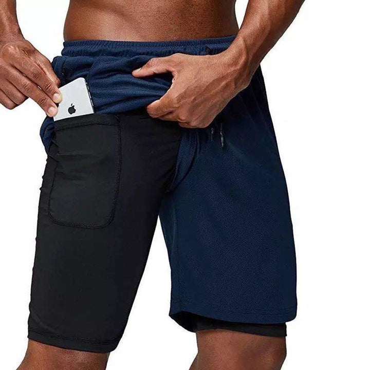 Zijaanzicht heren hardloopshorts, toont zak voor telefoon en optimale bewegingsvrijheid.