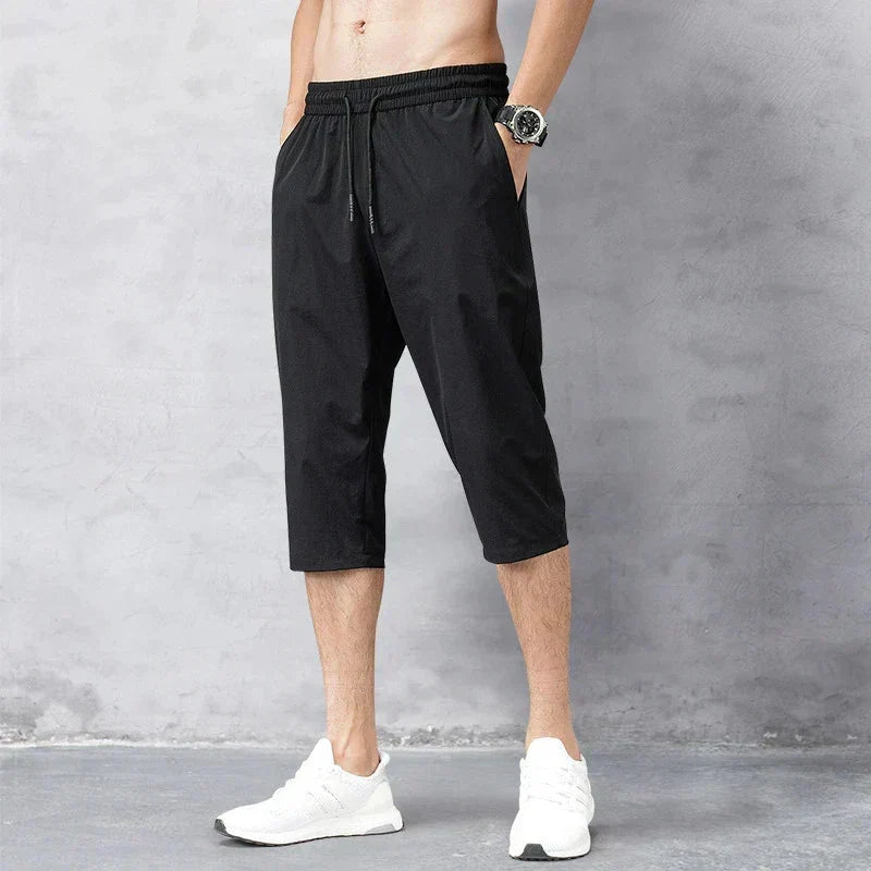 Heren zwembroek lange short, sneldrogend en comfortabel. Essentiële strandkleding voor vakantie en warme zomerdagen.