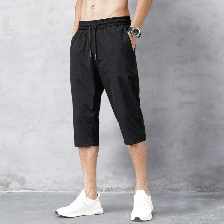 Heren zwembroek lange short, sneldrogend en comfortabel. Essentiële strandkleding voor vakantie en warme zomerdagen.