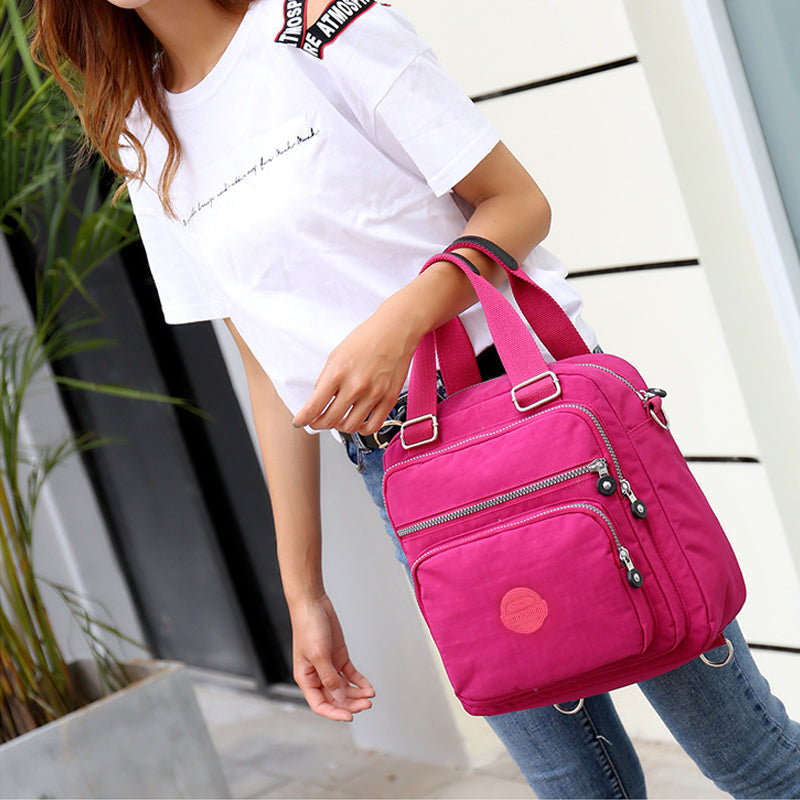 Compacte, waterdichte schoudertas voor dames, perfect georganiseerd voor al je essentials.
