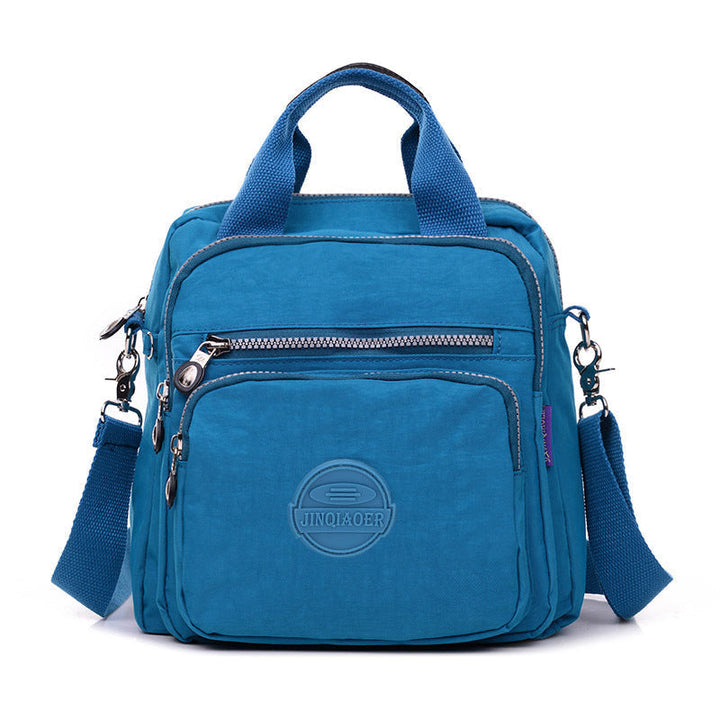 Lichtgewicht waterdichte reistas voor dames, compact genoeg voor handbagage, multifunctioneel.
