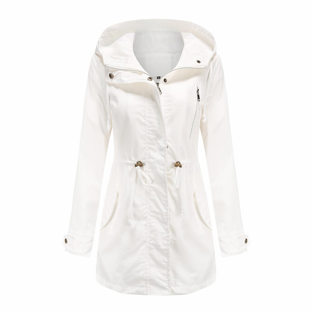 Modieuze dames trenchcoat, gestyled voor een veelzijdige look. Stijlvol en comfortabel, perfecte bovenkleding.