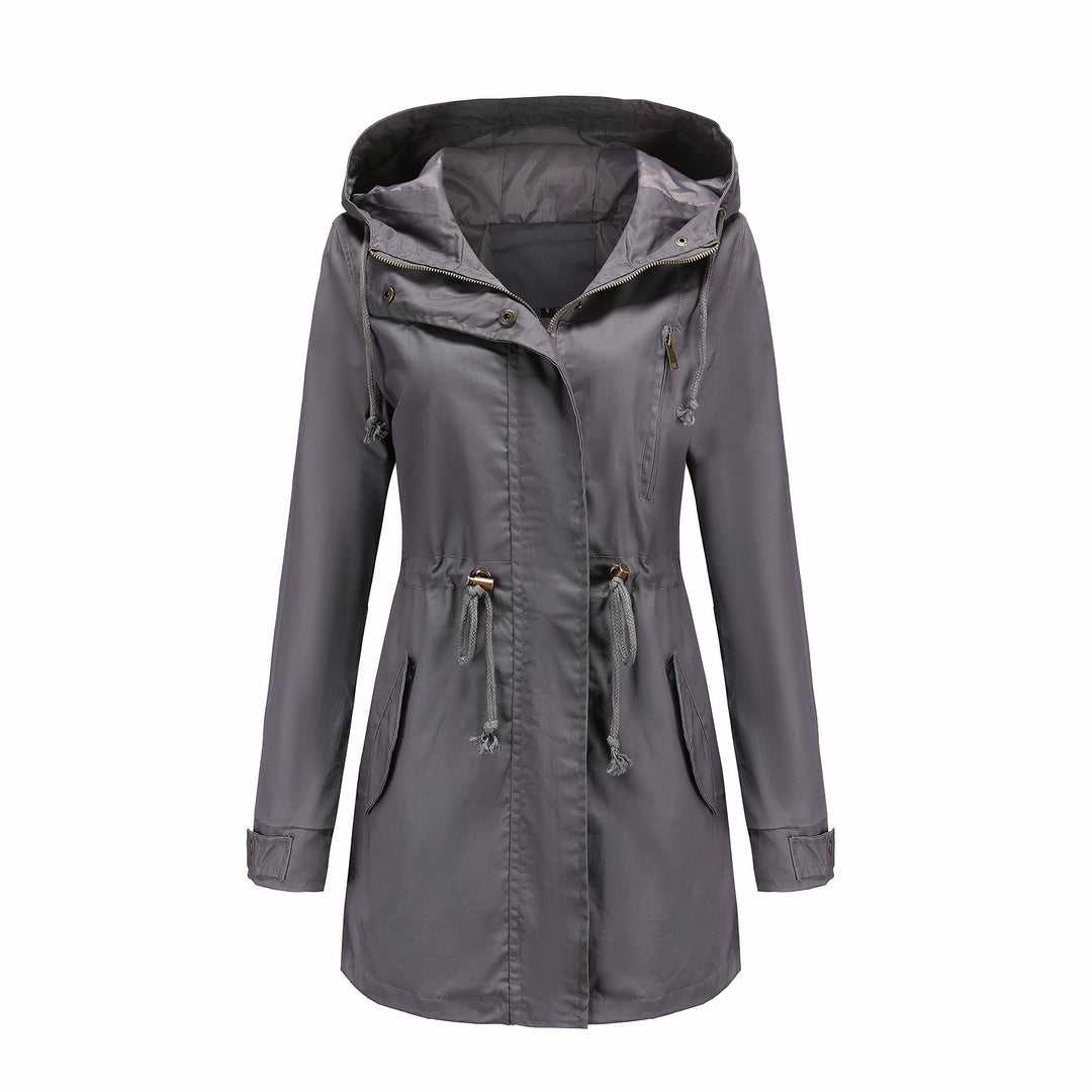 Dames trenchcoat in klassieke kleur, getailleerde pasvorm. Comfortabele en stijlvolle herfstjas.