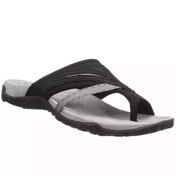 Close-up van het comfortabele, ademende orthopedische voetbed van de dames slipper, ideaal voor voetverzorging.