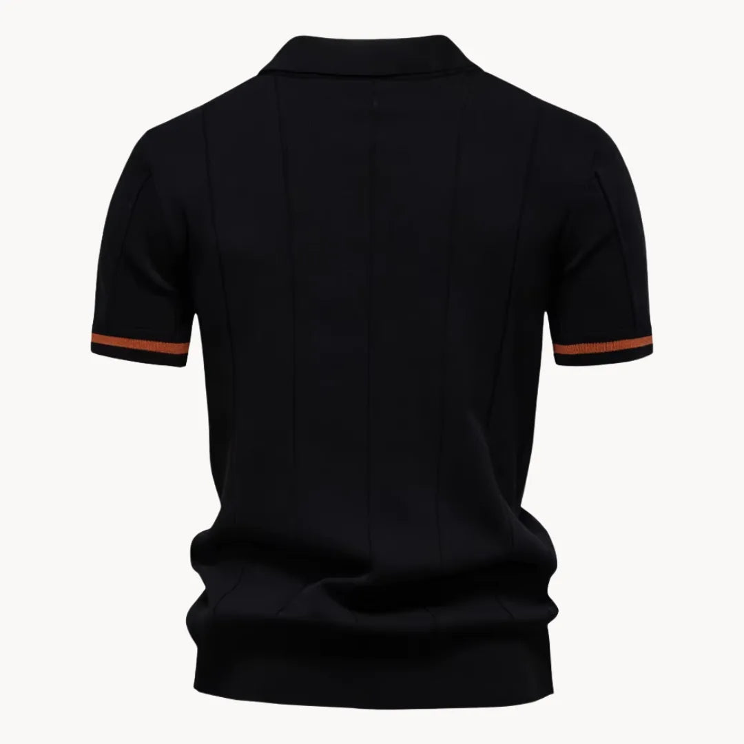 Hoogwaardige rits detail op de kraag van deze comfortabele heren polo, duurzaam en stijlvol.