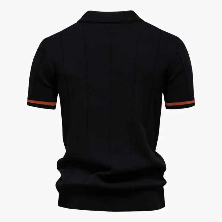 Hoogwaardige rits detail op de kraag van deze comfortabele heren polo, duurzaam en stijlvol.