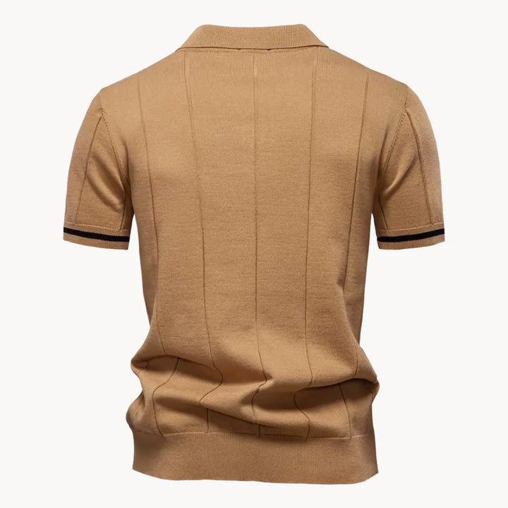 Gebreide heren polo met korte ritskraag. Perfect voor een moderne casual of smart-casual outfit.